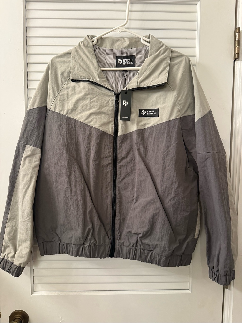 Barbell brigade windbreaker